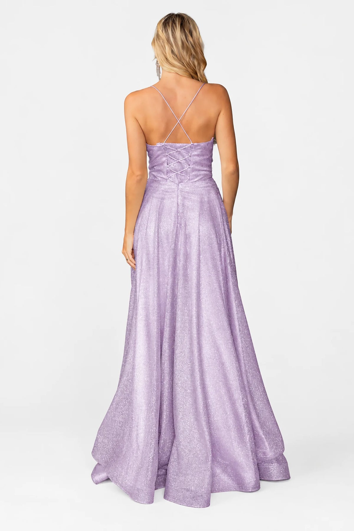 Crossed straps and flowing skirt complete the Lilac Shimmering Prom Dress.