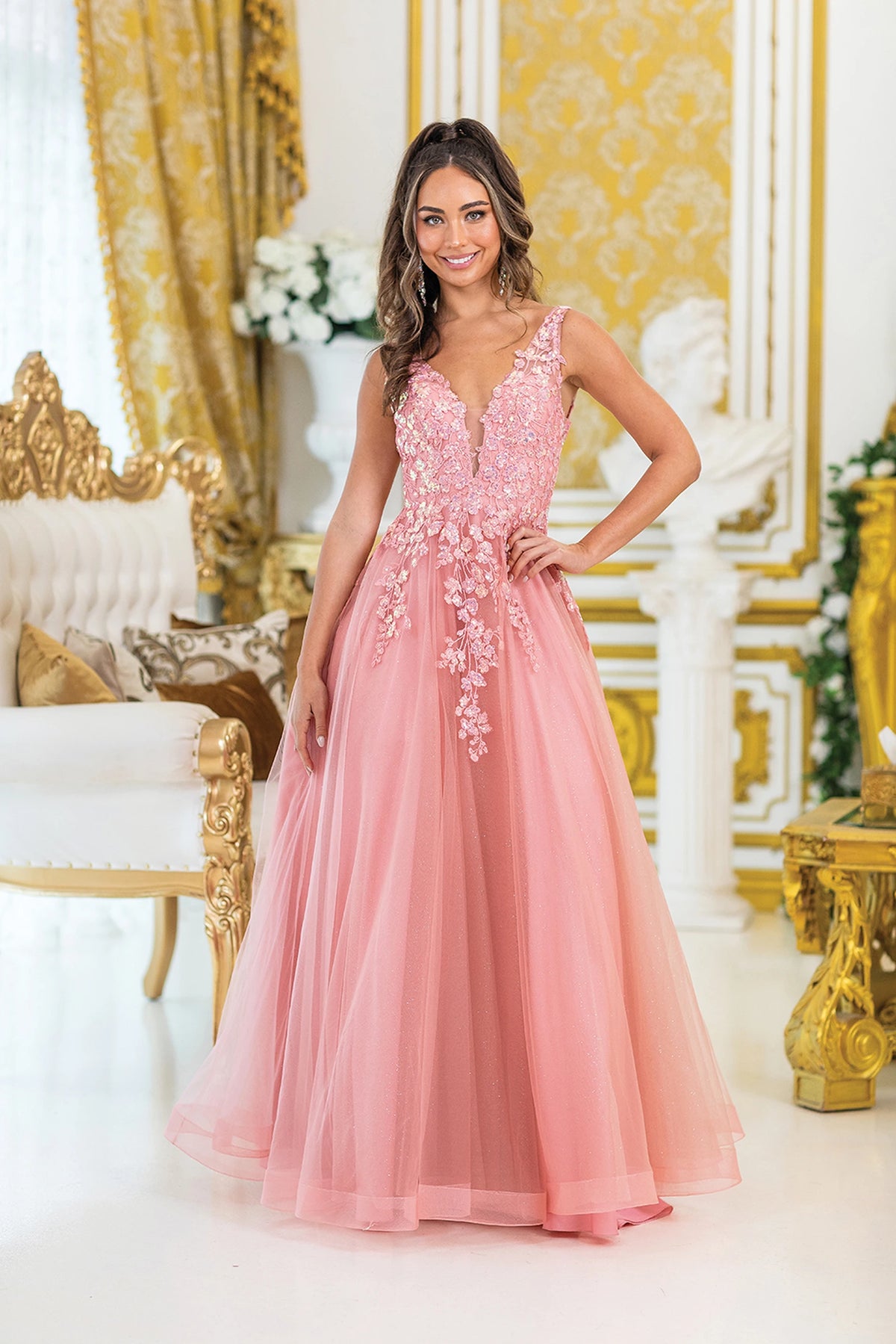 Featuring a floor-length skirt, this Pink prom dress is shown in full view.