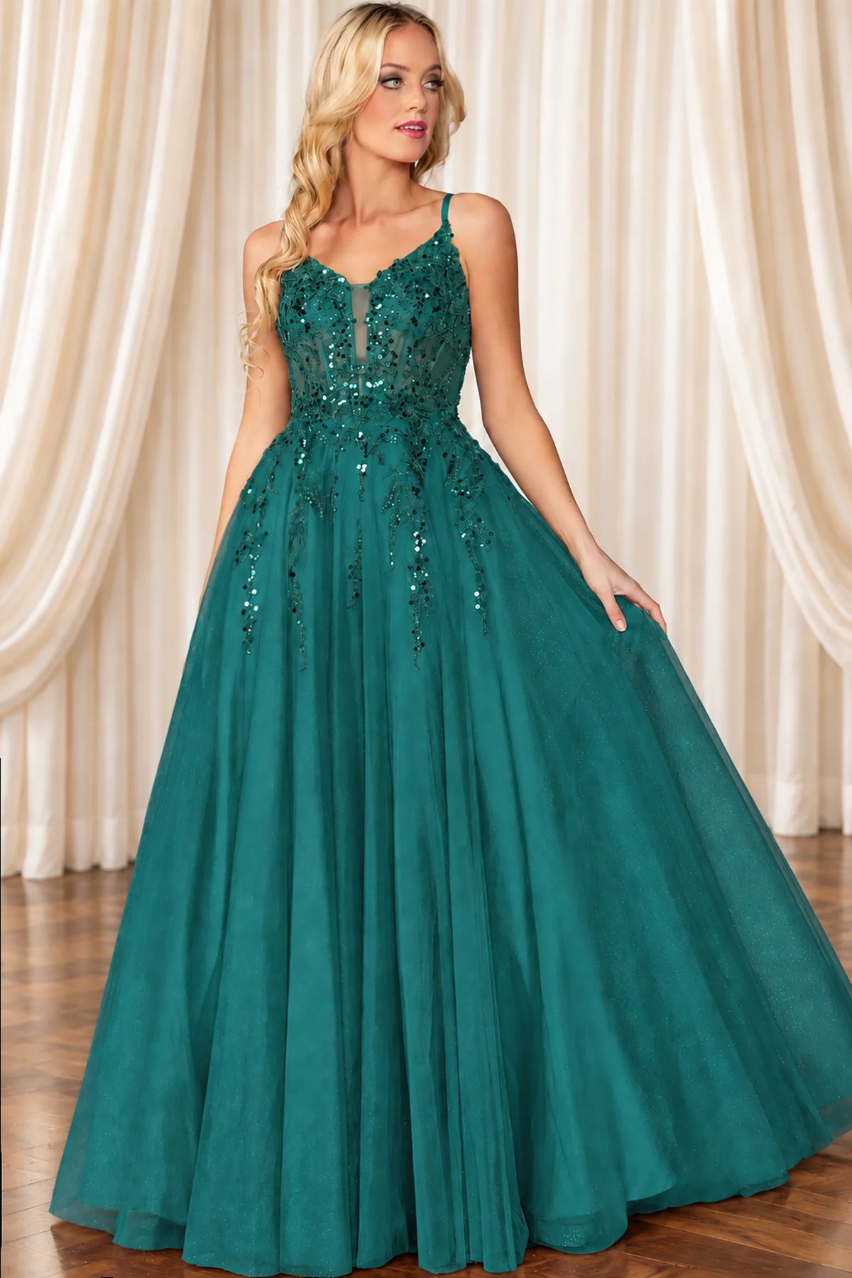Embroidered bodice and full skirt define the Hunter Green Beaded Prom Dress.