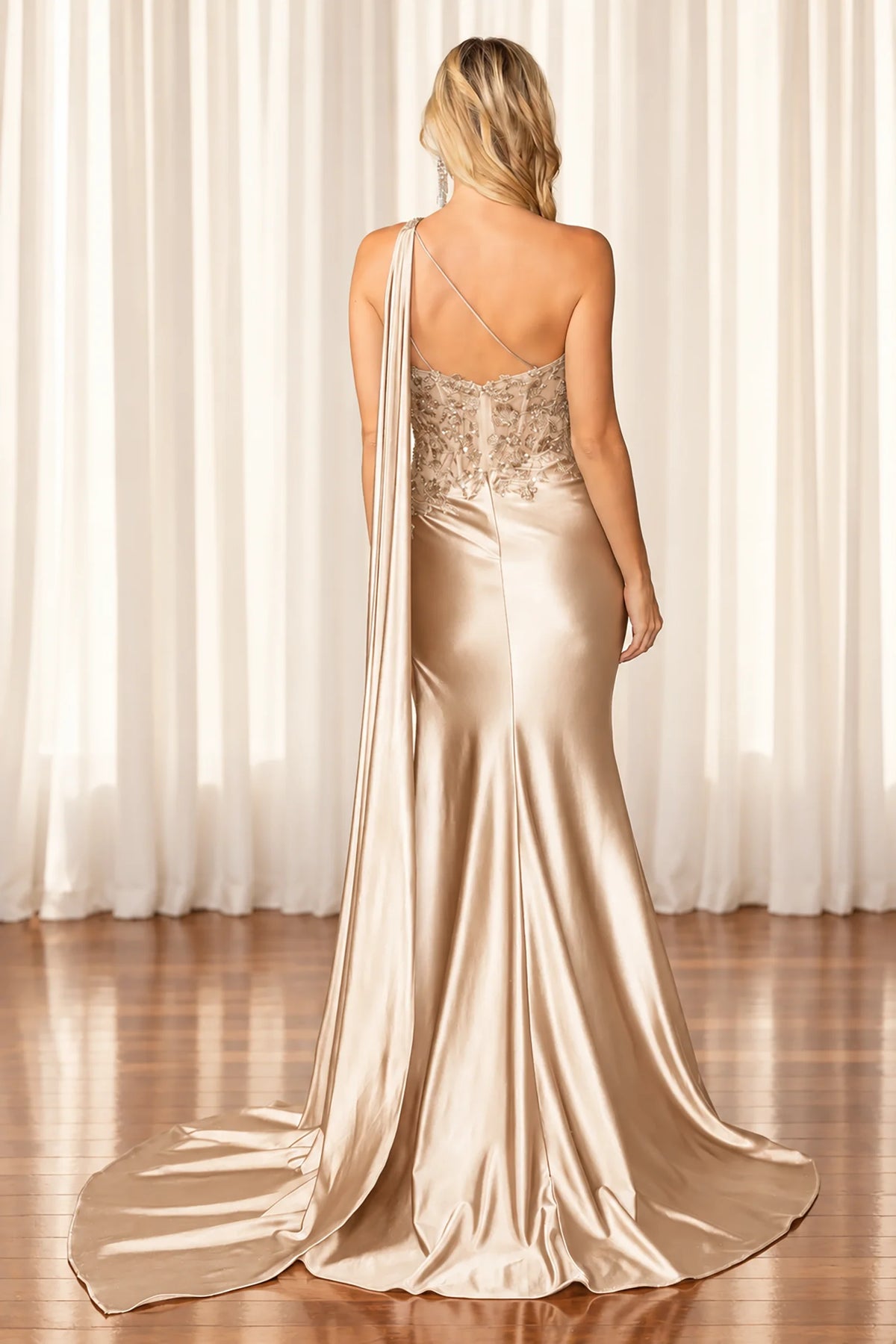 Open back and embroidered detail complete the Champagne Embroidered Prom Dress.