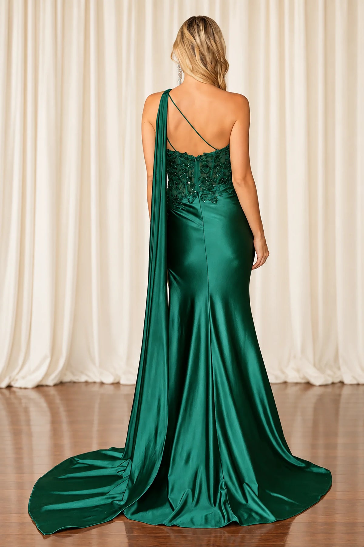 Open back and embroidered detail complete the Hunter Green Embroidered Prom Dress.