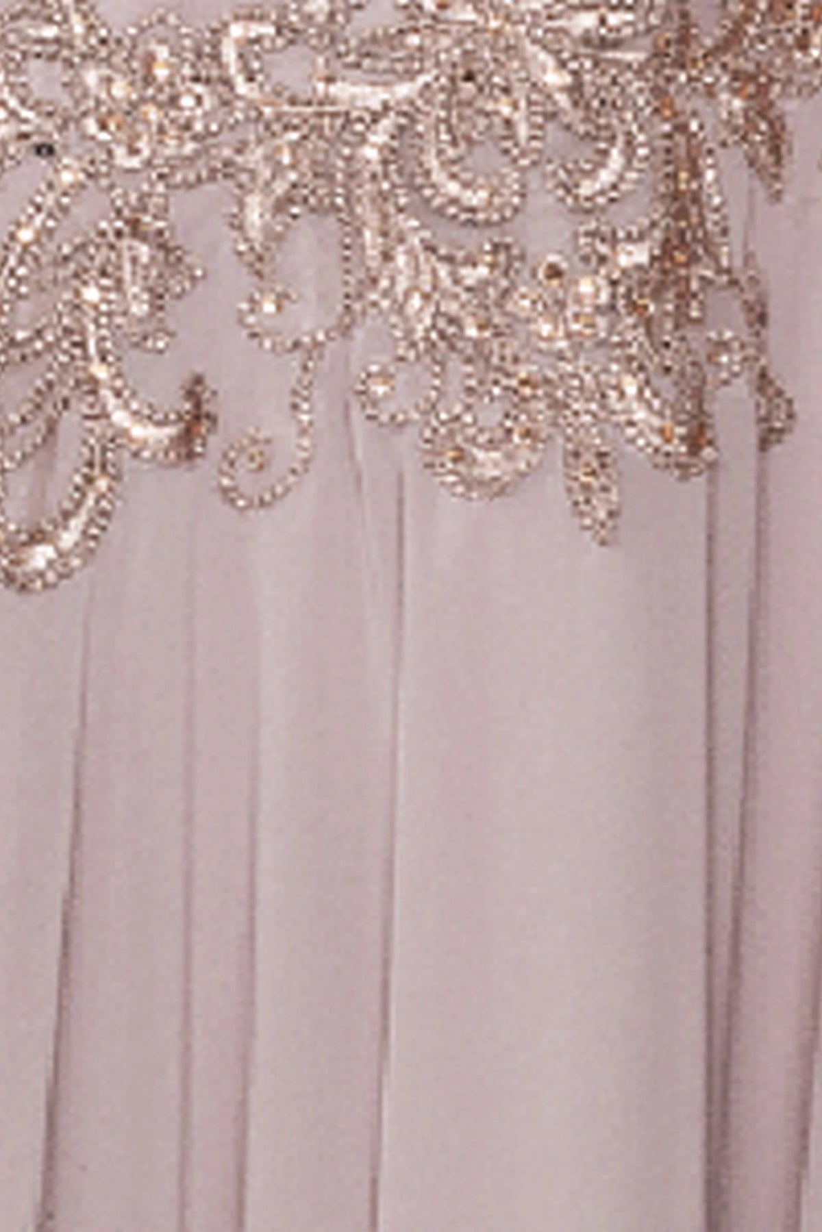 Featuring textured embellishments, this Mauve prom dress is shown in detail.