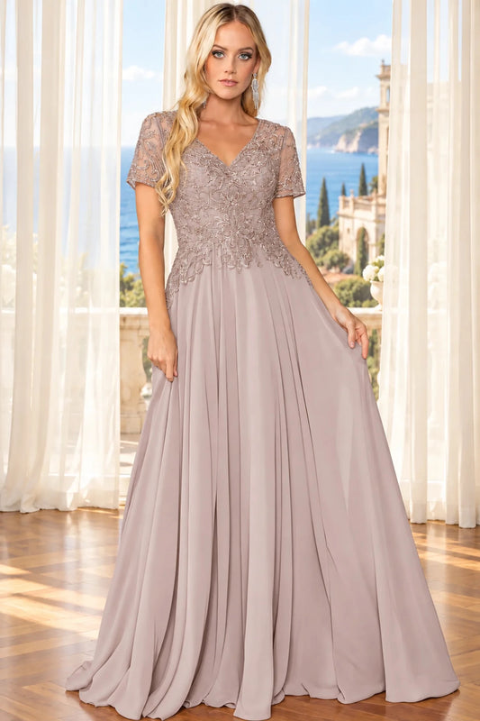 Lace sleeves and flowing skirt highlight the Mauve Lace Detailed Prom Dress.