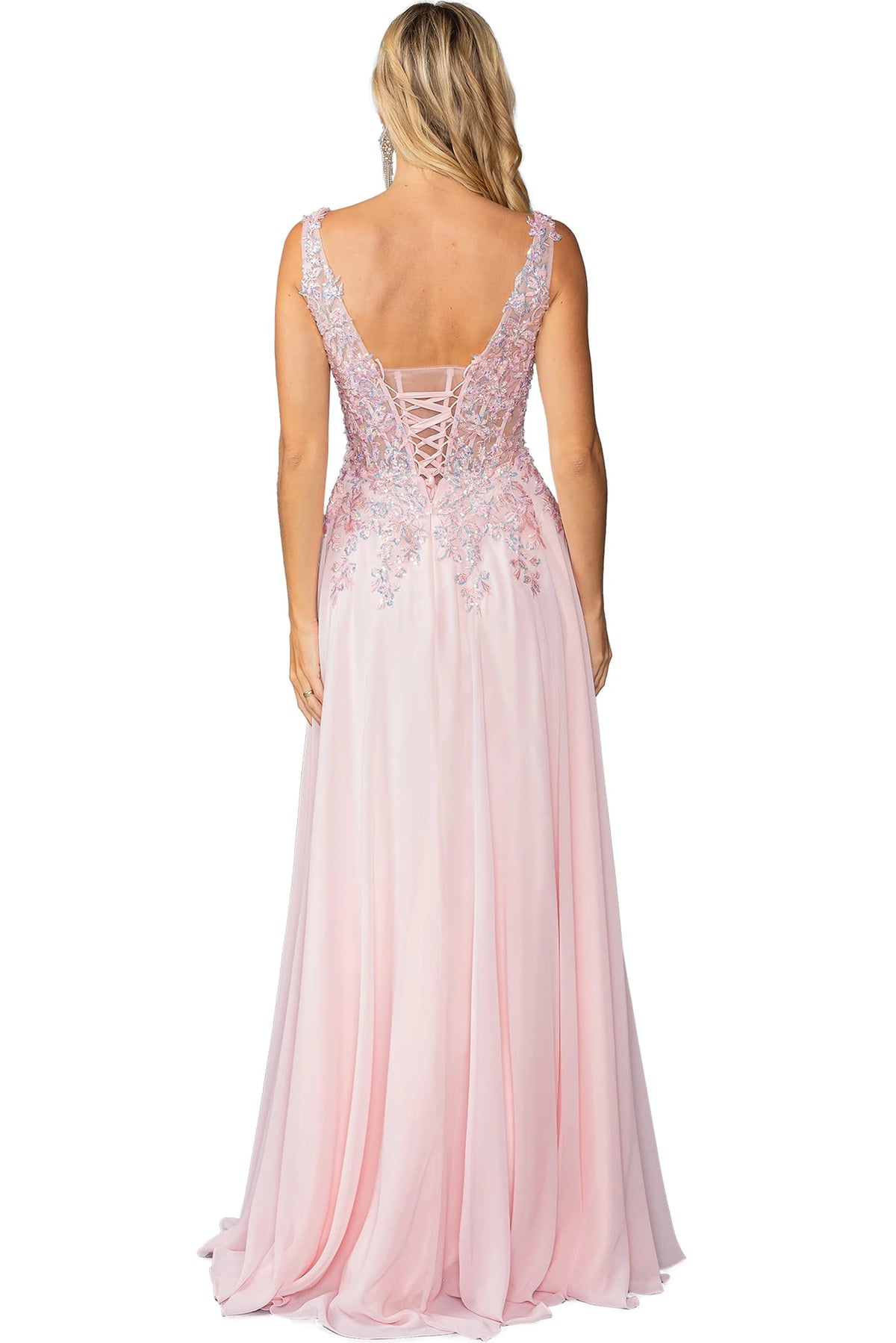 From the back, the Blush prom dress reveals its floor-length skirt.