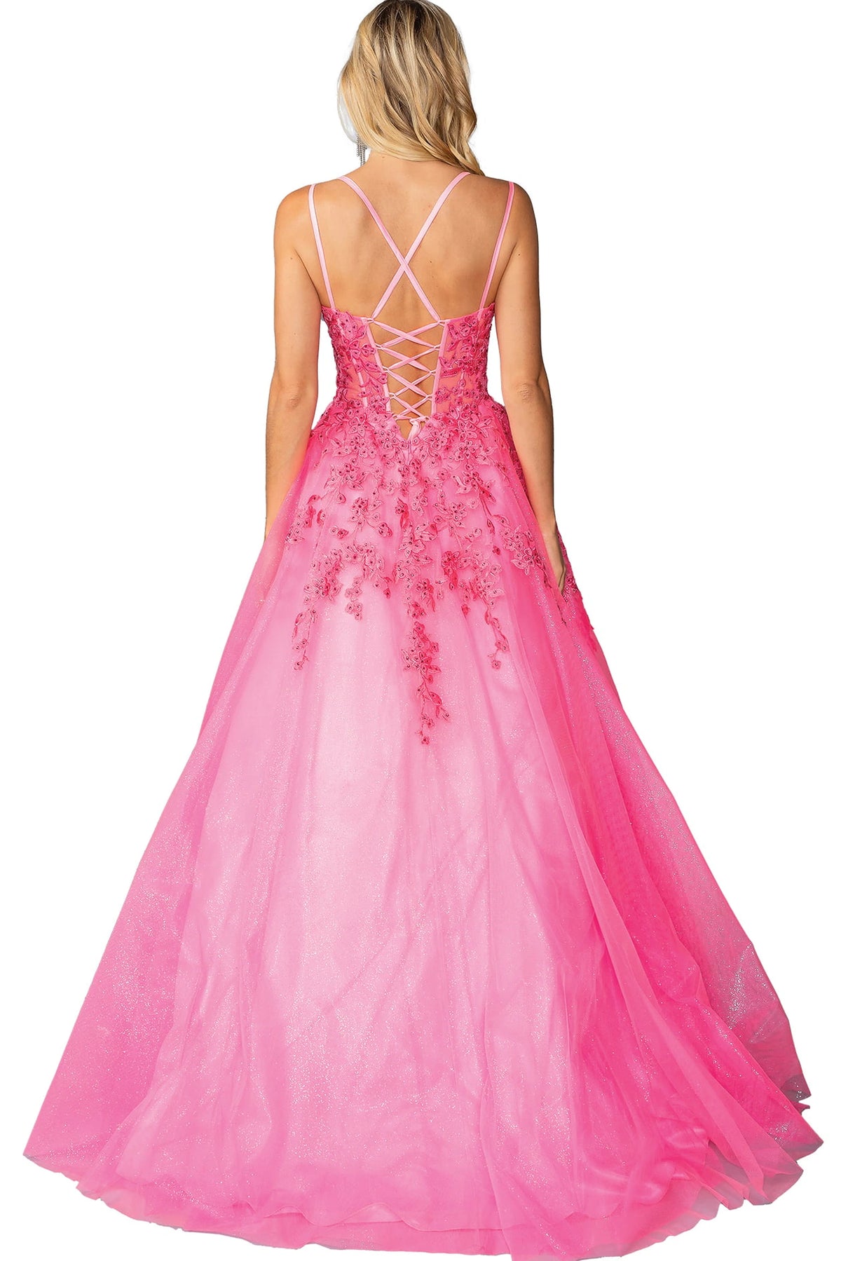 From the back, the Hot Pink prom dress reveals its floor-length skirt.