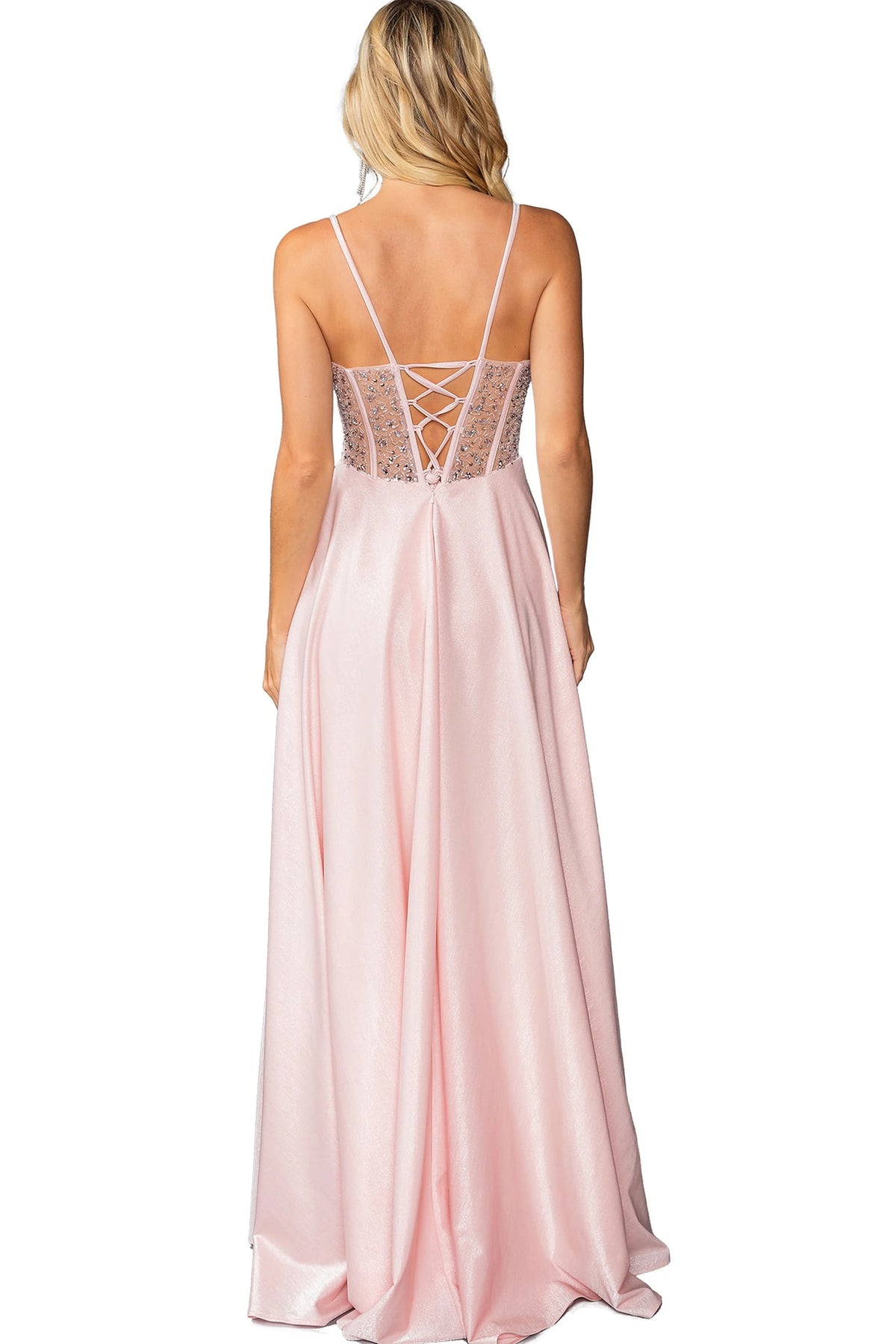 From the back, the Blush prom dress reveals its floor-length skirt.