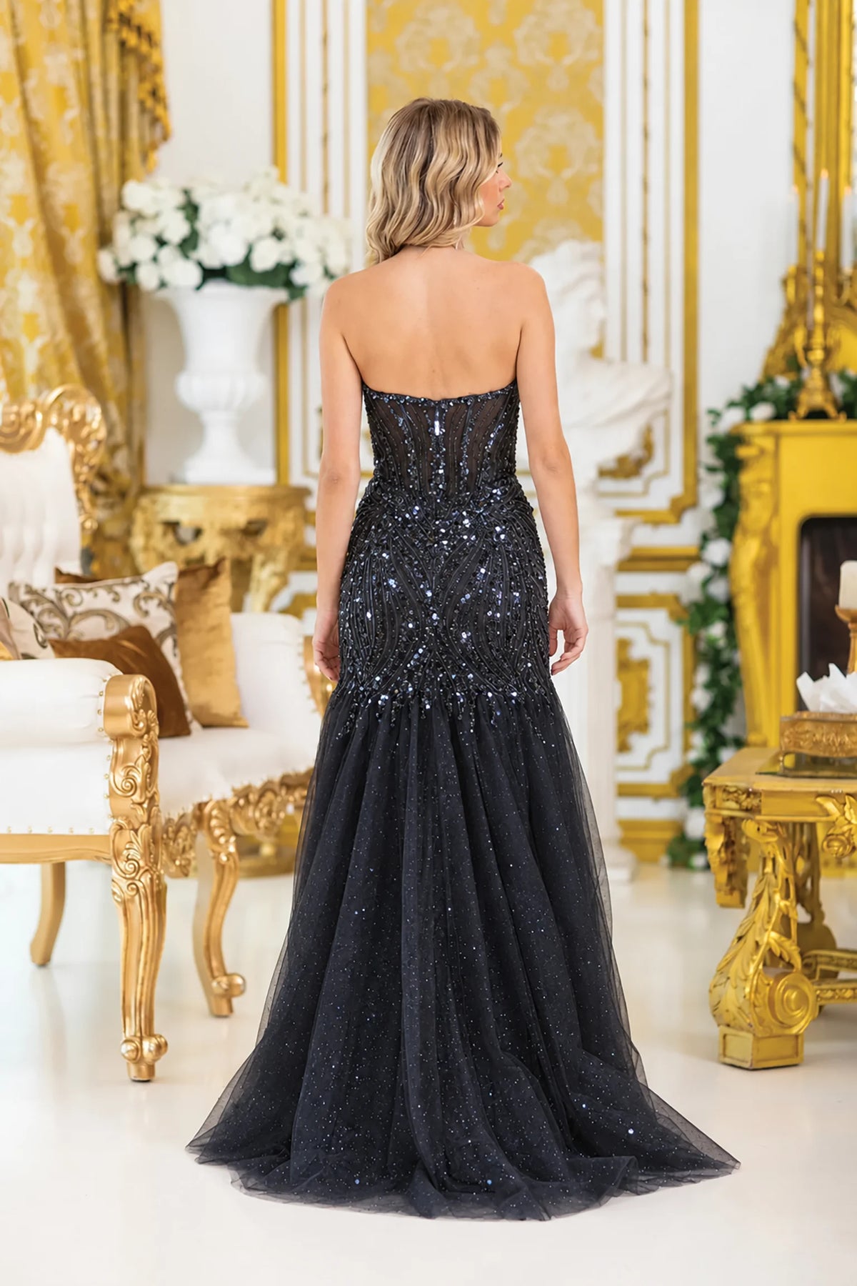 Open back and sweeping skirt complete the Black Sequin Embellished Prom Dress.
