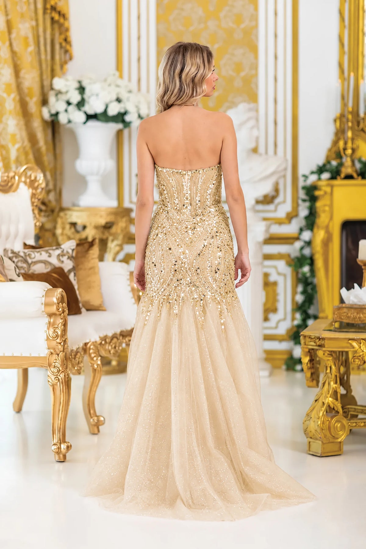Open back and sweeping skirt complete the Champagne Sequin Embellished Prom Dress.
