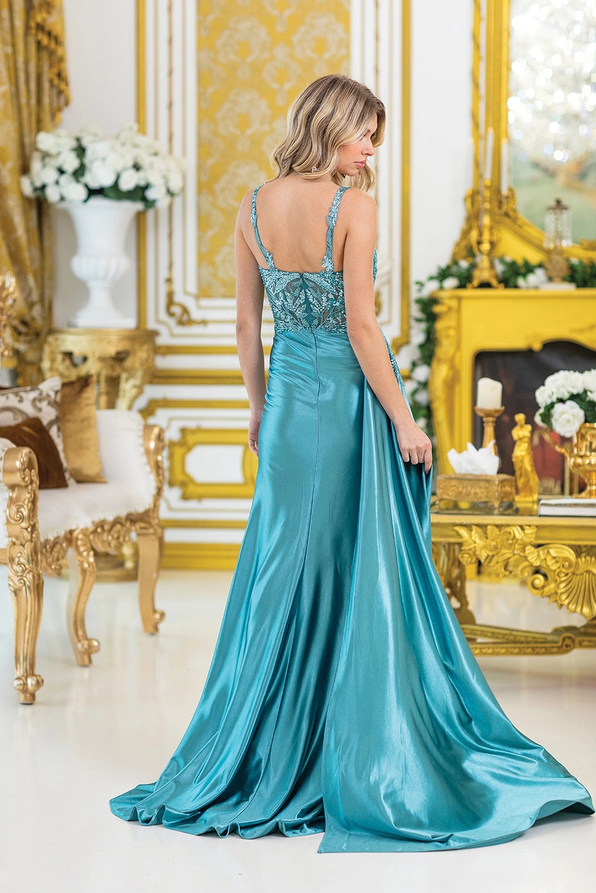 From the back, the Dark Sage prom dress reveals its floor-length skirt.