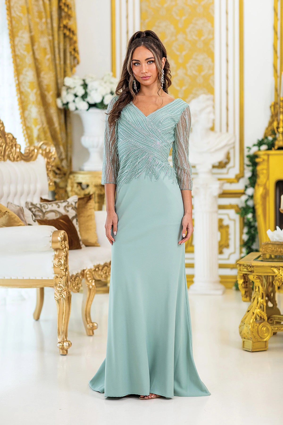 Featuring a floor-length skirt, this Sage prom dress is shown in full view.