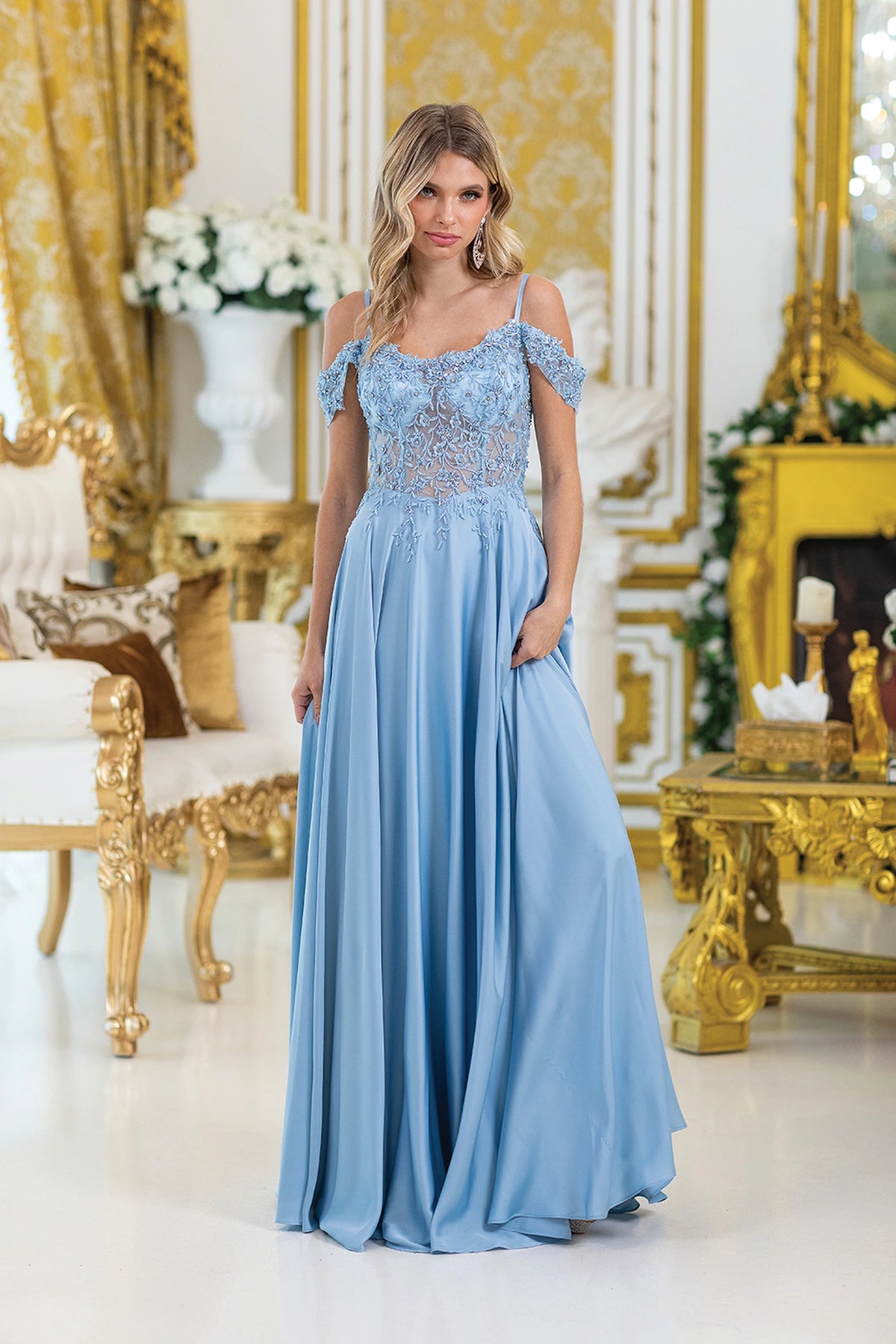 Featuring a floor-length skirt, this Bahama Blue prom dress is shown in full view.