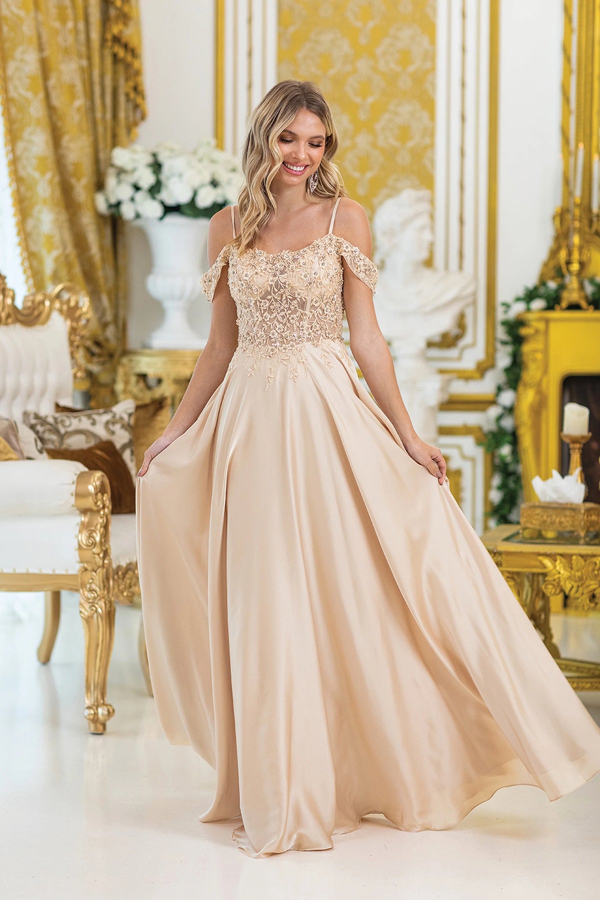Featuring a floor-length skirt, this Champagne prom dress is shown in full view.