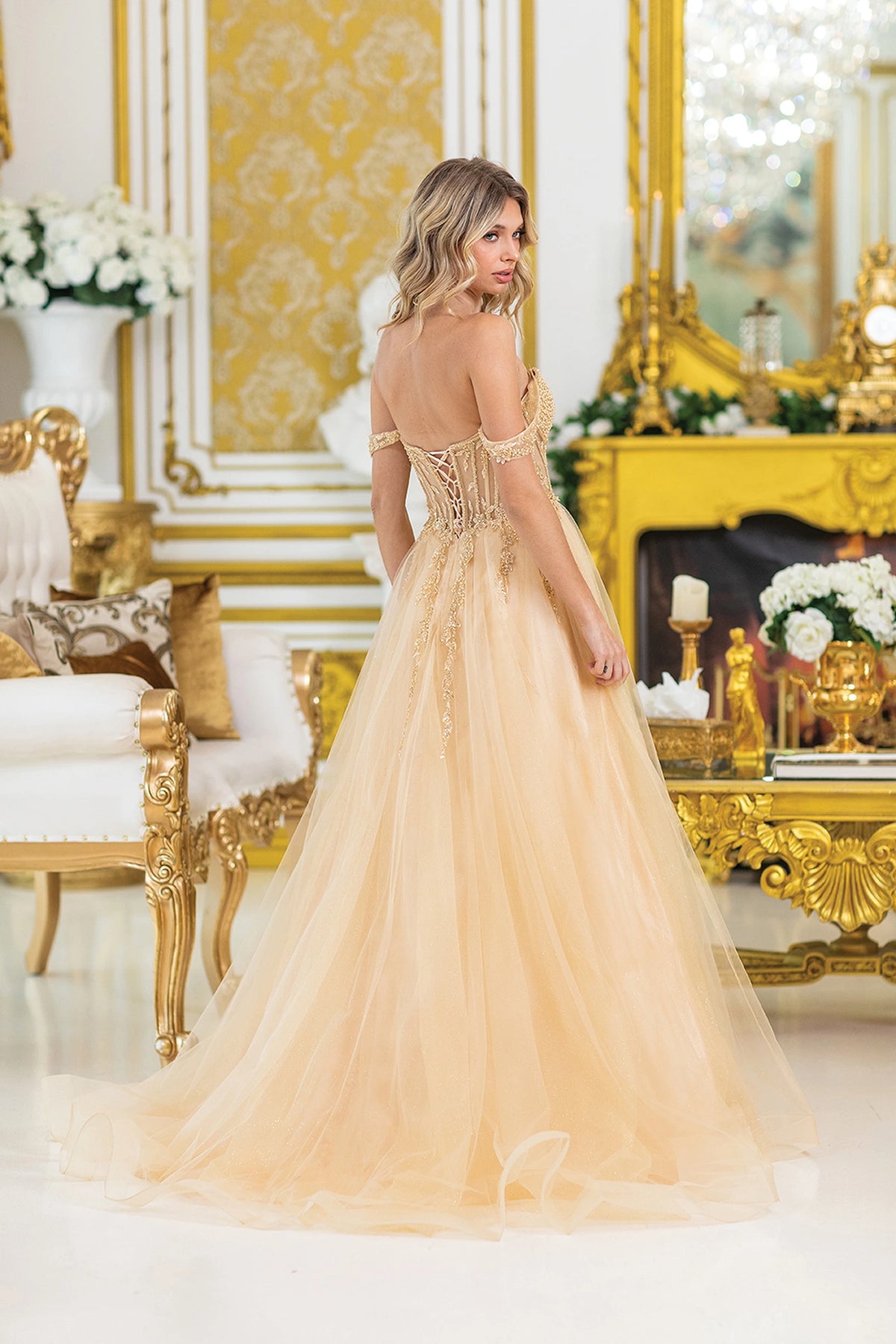Showing its floor-length skirt, the Champagne prom dress highlights the garment construction.