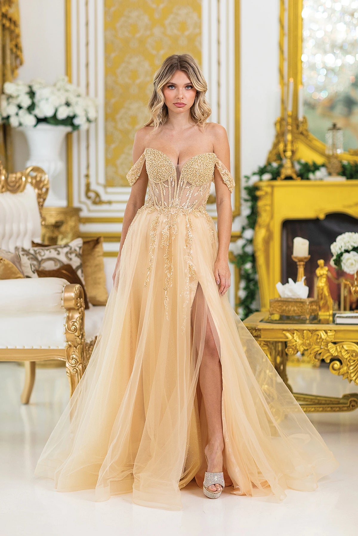 Featuring a floor-length skirt, this Champagne prom dress is shown in full view.