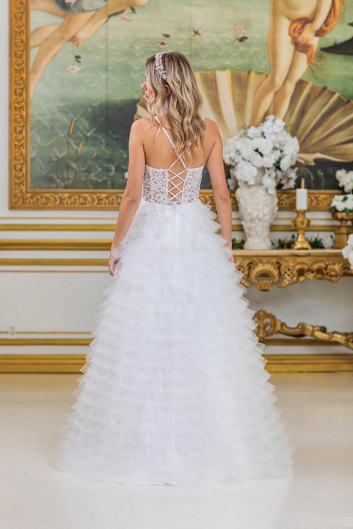 From the back, the Off-White prom dress reveals its floor-length skirt.