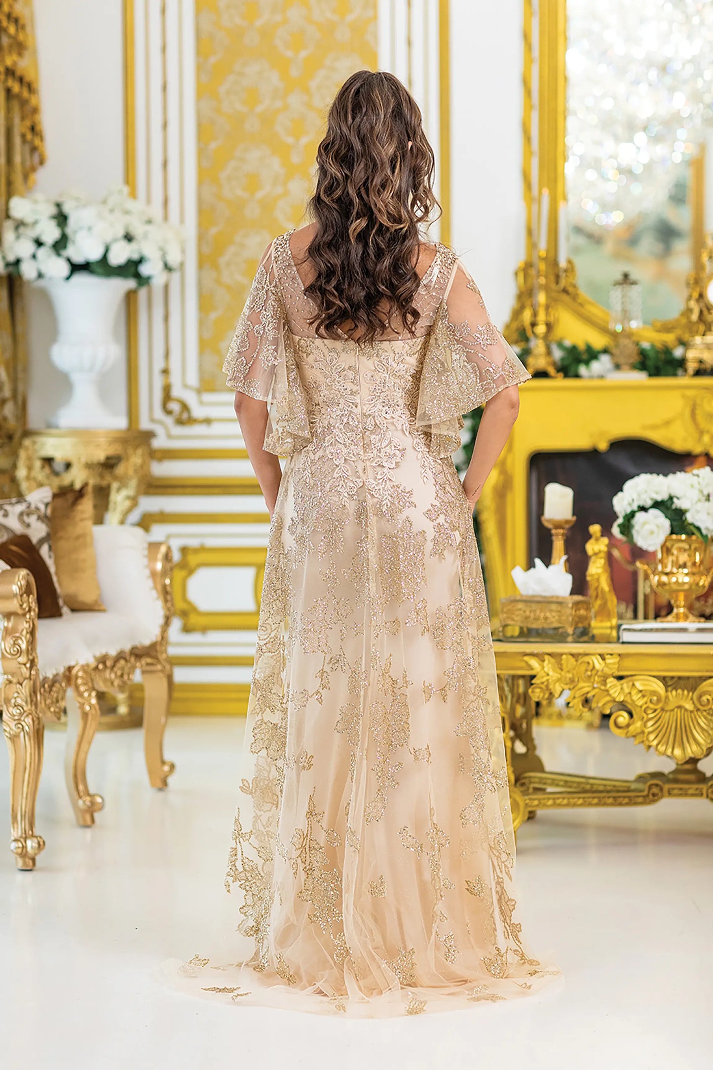 Champagne evening dress completed with zipper back closure