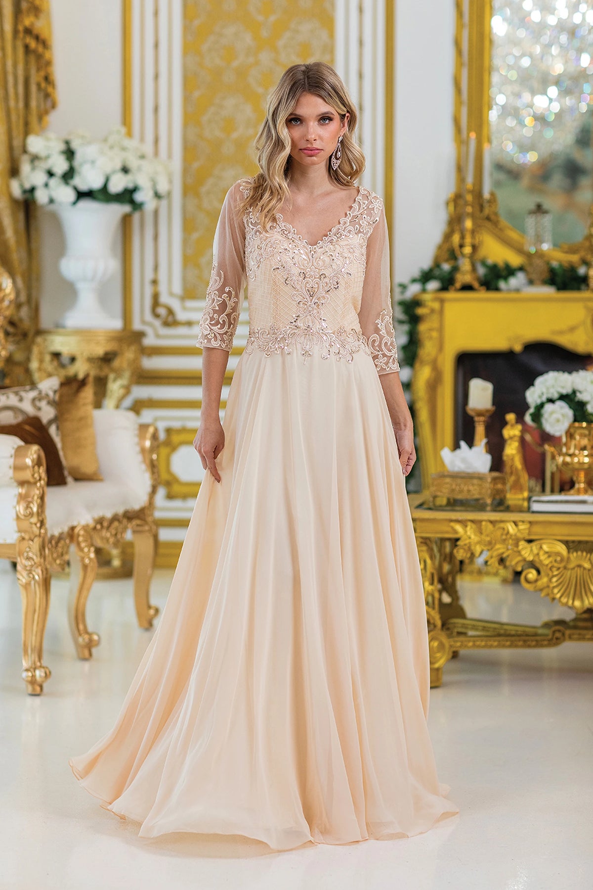 Featuring a floor-length skirt, this Champagne prom dress is shown in full view.