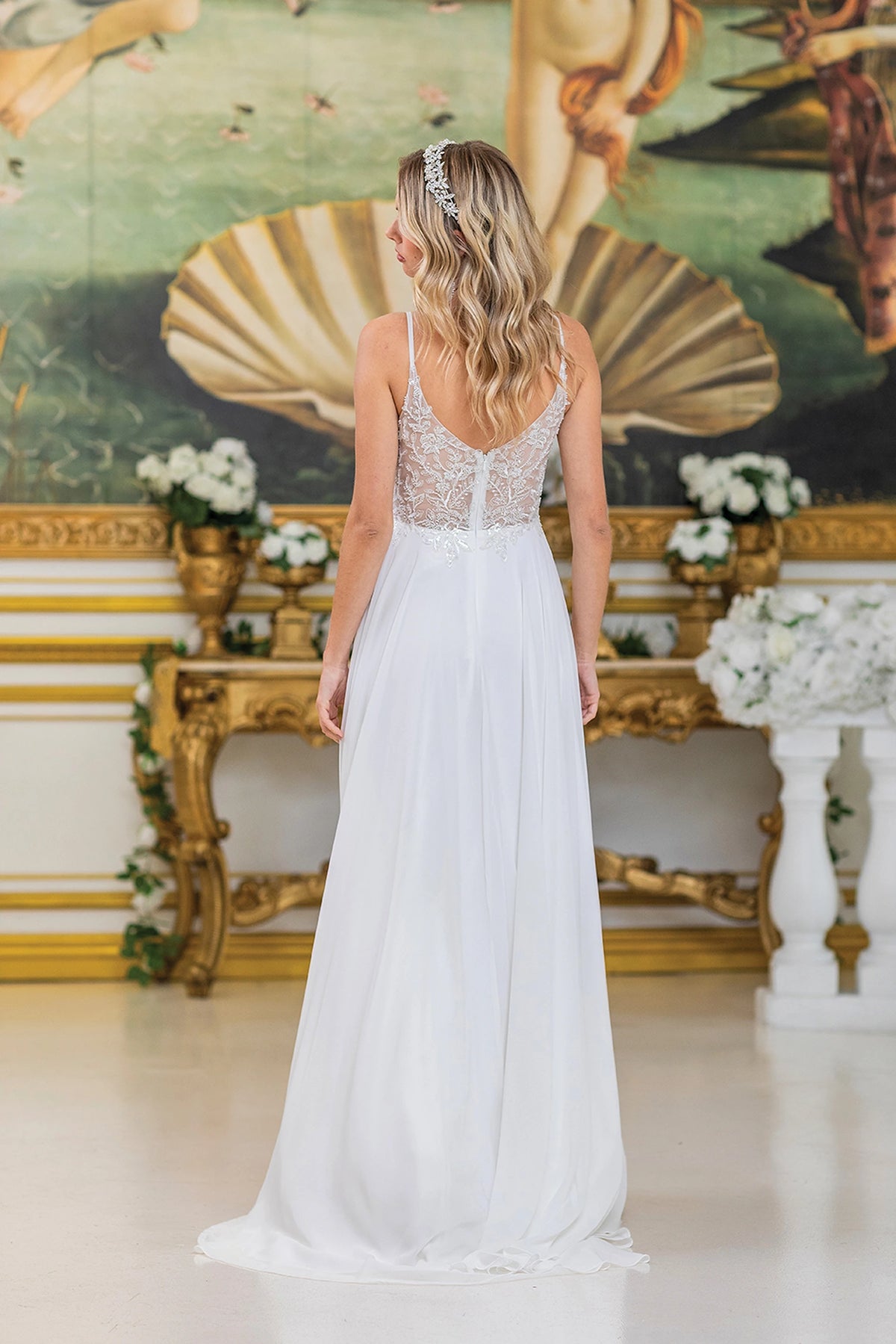 From the back, the Off-White prom dress reveals its floor-length skirt.