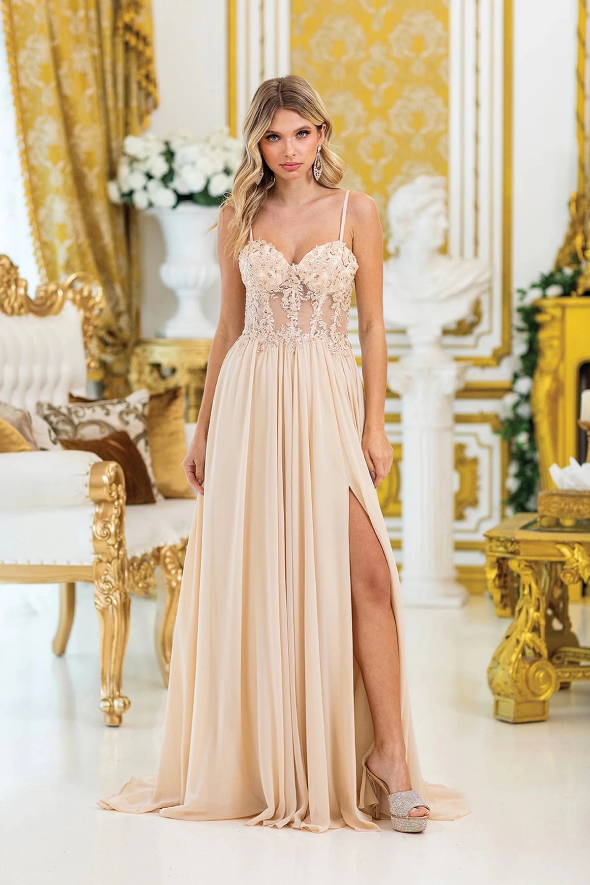 Featuring a floor-length skirt, this Champagne prom dress is shown in full view.