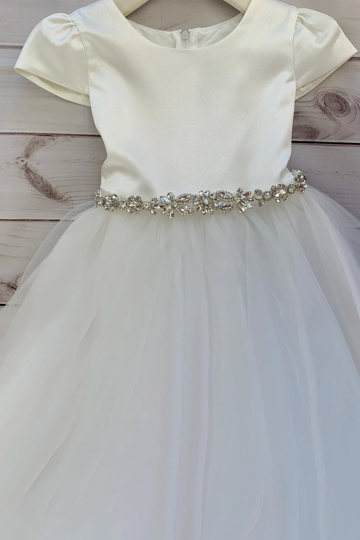 Satin puff sleeve flower girl dress with tulle skirt and detachable rhinestone belt.