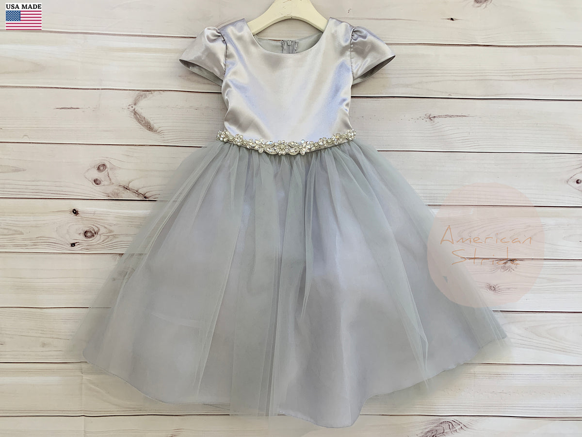 Satin puff sleeve flower girl dress with layered tulle skirt and detachable rhinestone belt.