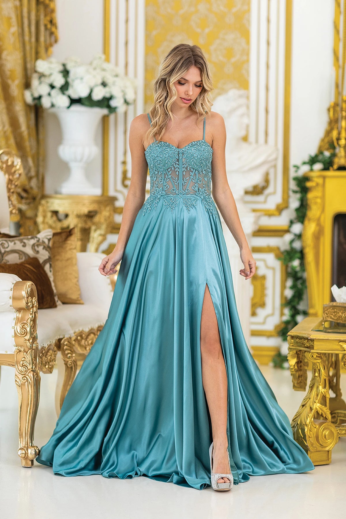 Featuring a floor-length skirt, this Sage prom dress is shown in full view.