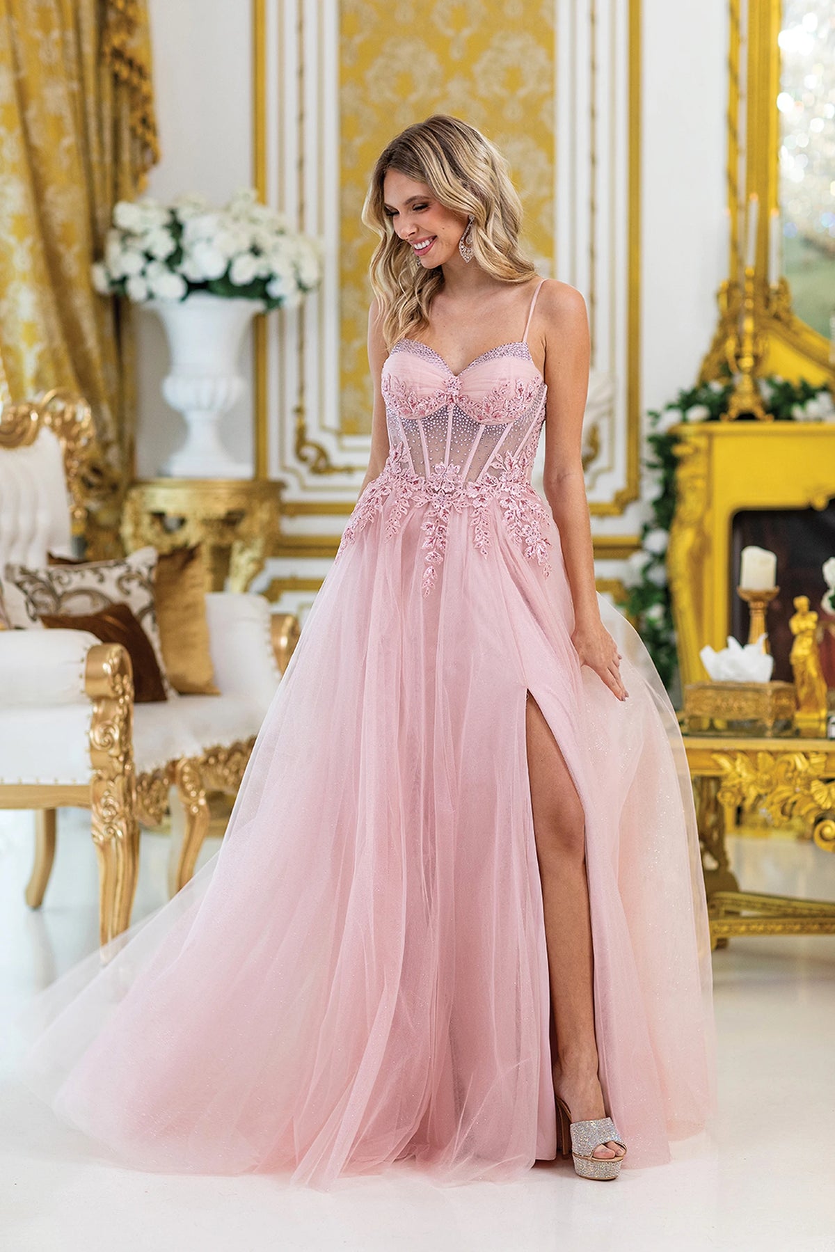 Featuring a floor-length skirt, this Blush prom dress is shown in full view.