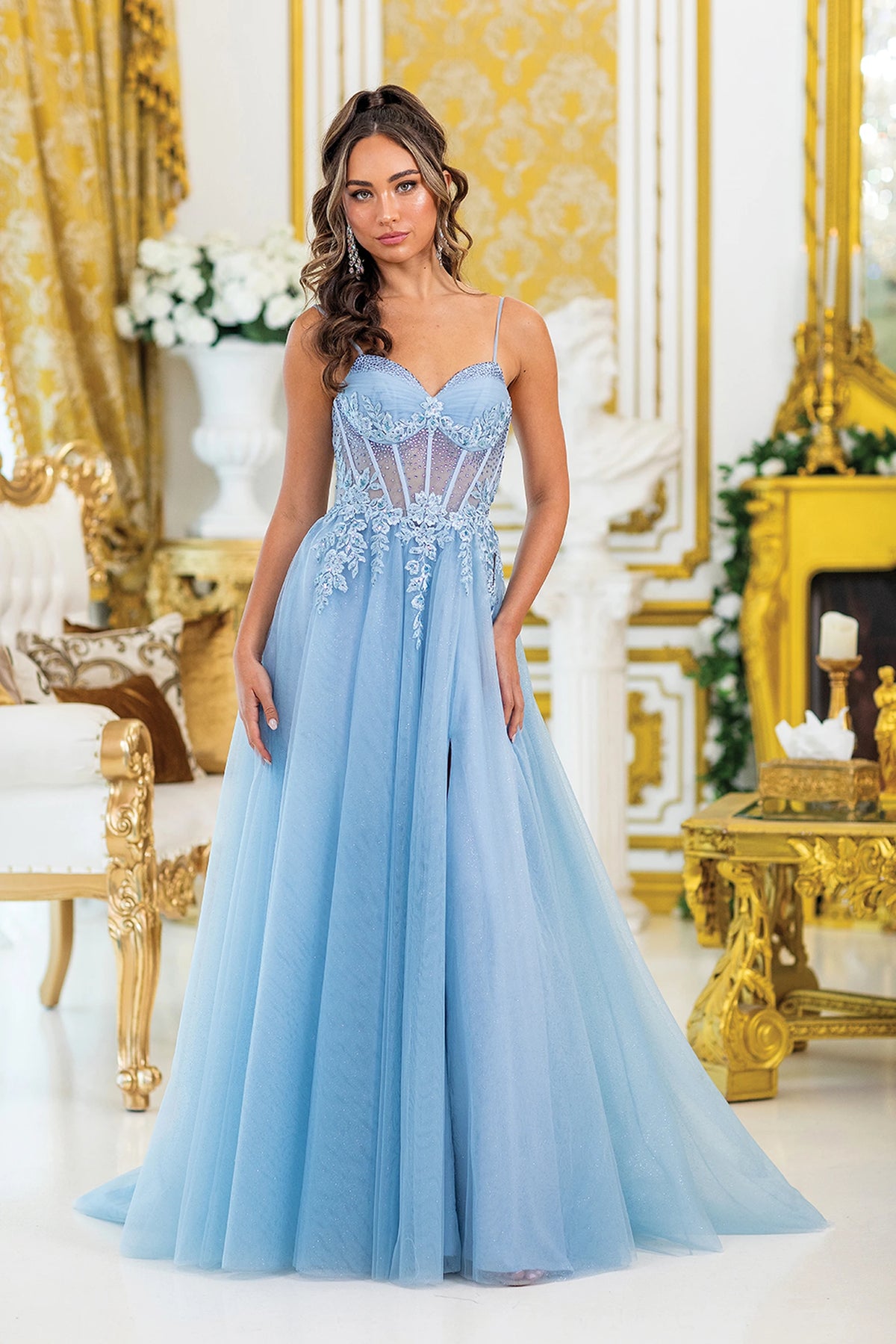 Featuring a floor-length skirt, this Dusty Blue prom dress is shown in full view.