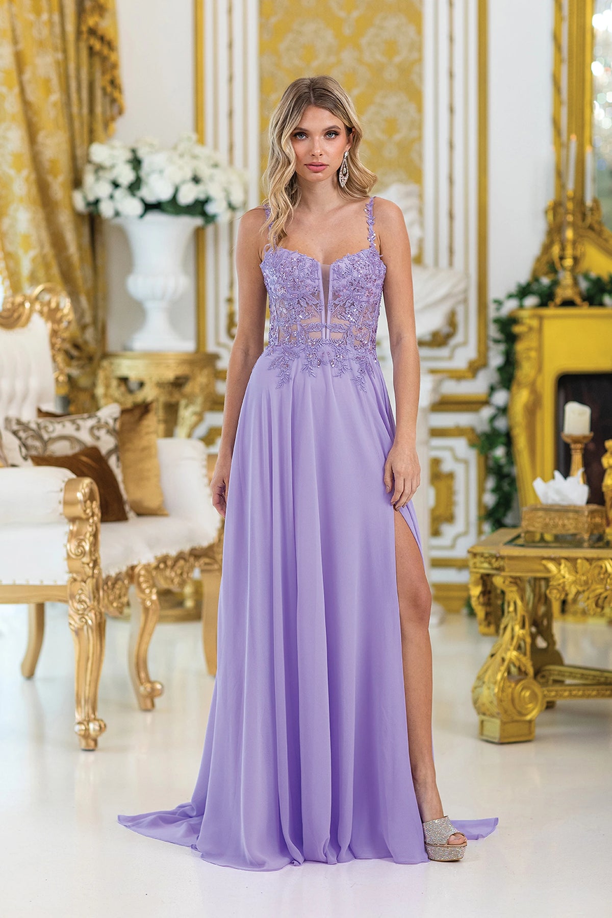 Featuring a floor-length skirt, this Lilac prom dress is shown in full view.