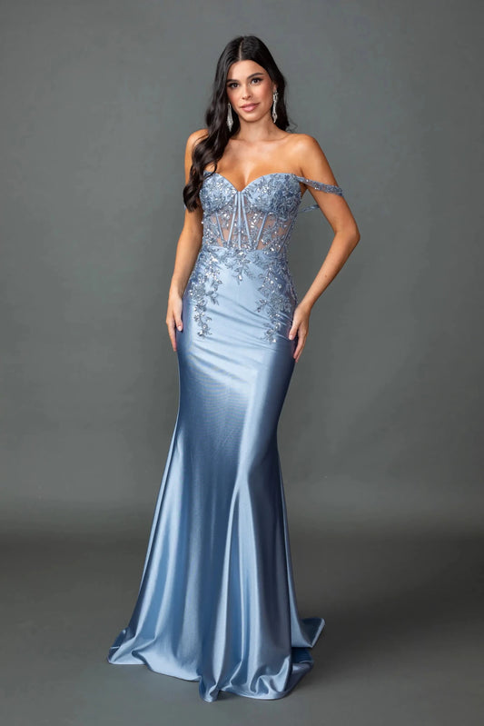 Showing beaded corset detailing above its satin skirt, this Dusty Blue prom dress is shown in full view.