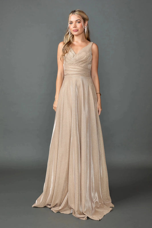 Showing a ruched V-neck bodice and flowing glitter skirt, this Champagne prom dress is shown in full view.