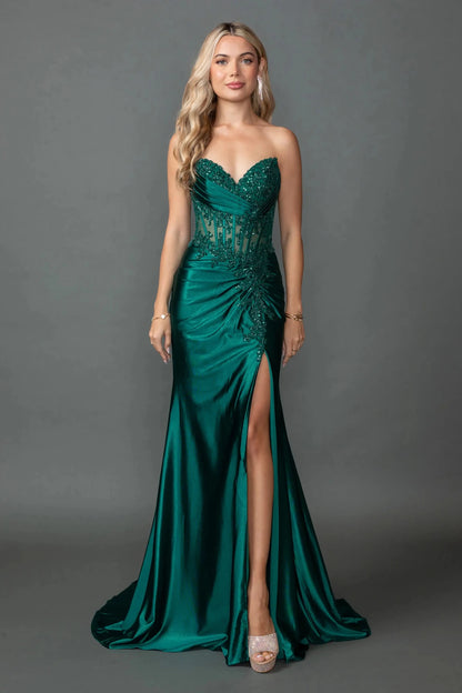 Woman in Hunter green strapless satin prom dress with corset and slit.