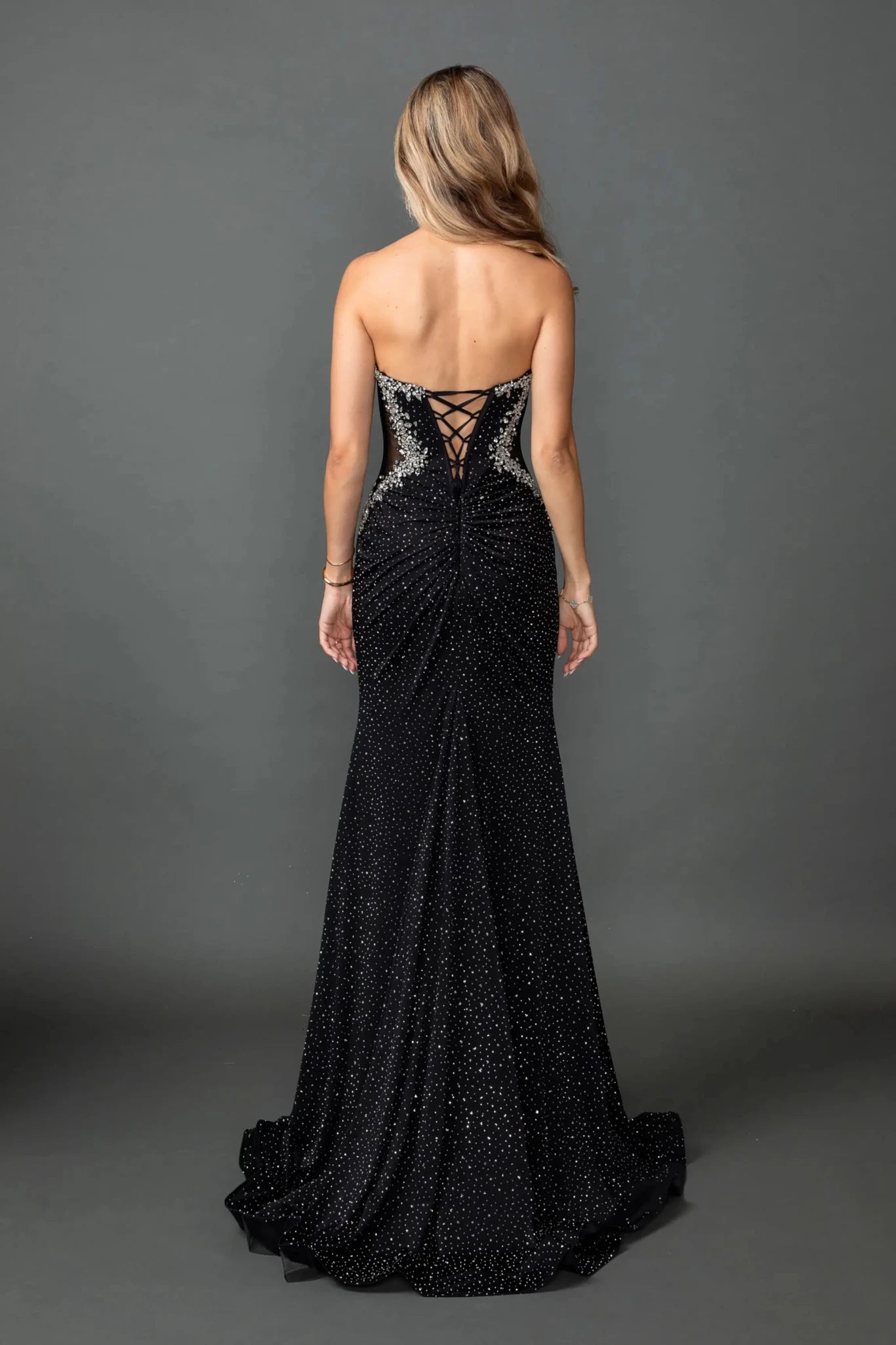 Back full Length view of Sleek Black Strapless Beaded Corset Prom Dress