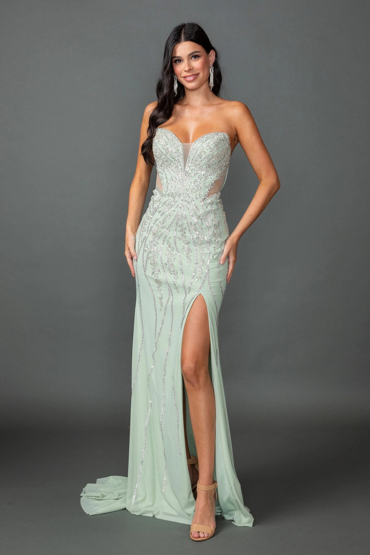 Featuring a floor-length skirt, this Sage prom dress is shown in full view.