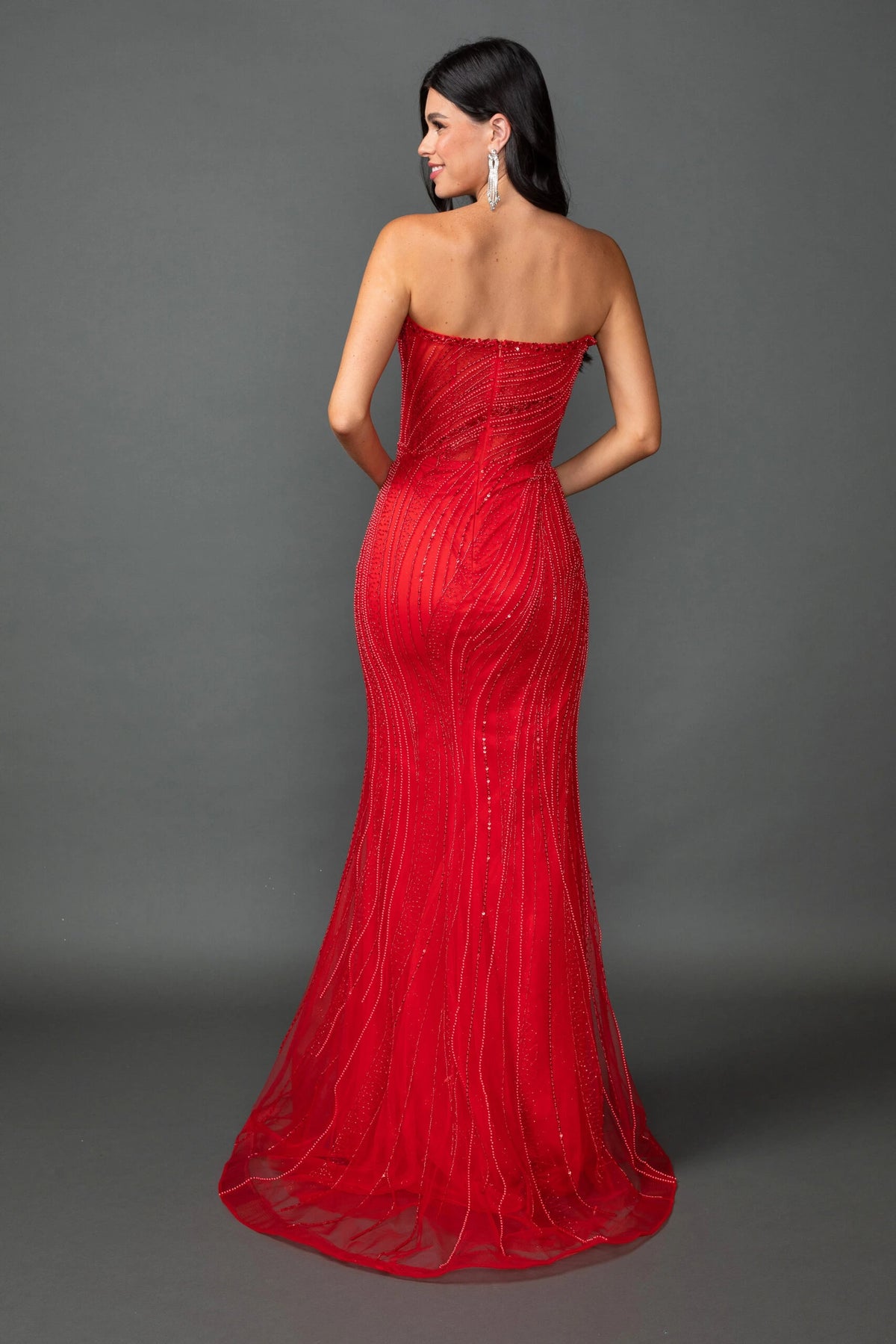 Highlighting the floor-length skirt, this view presents the Red prom dress.