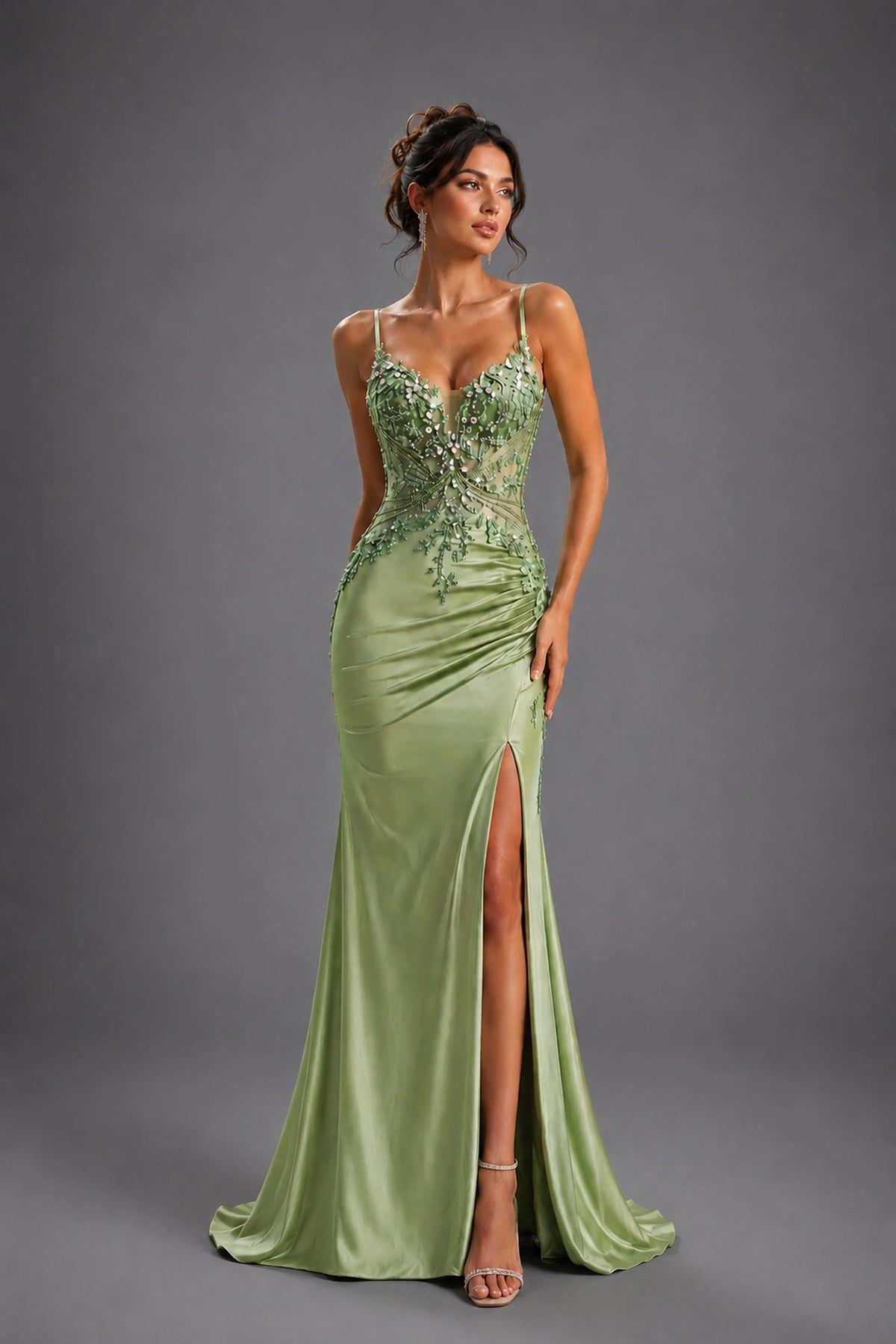 Featuring a floor-length skirt, this Sage prom dress is shown in full view.