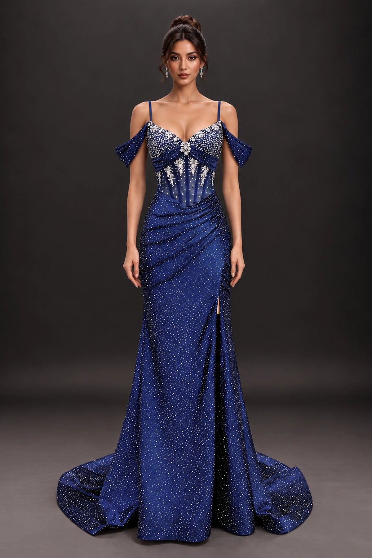 Featuring a floor-length skirt, this Navy prom dress is shown in full view.