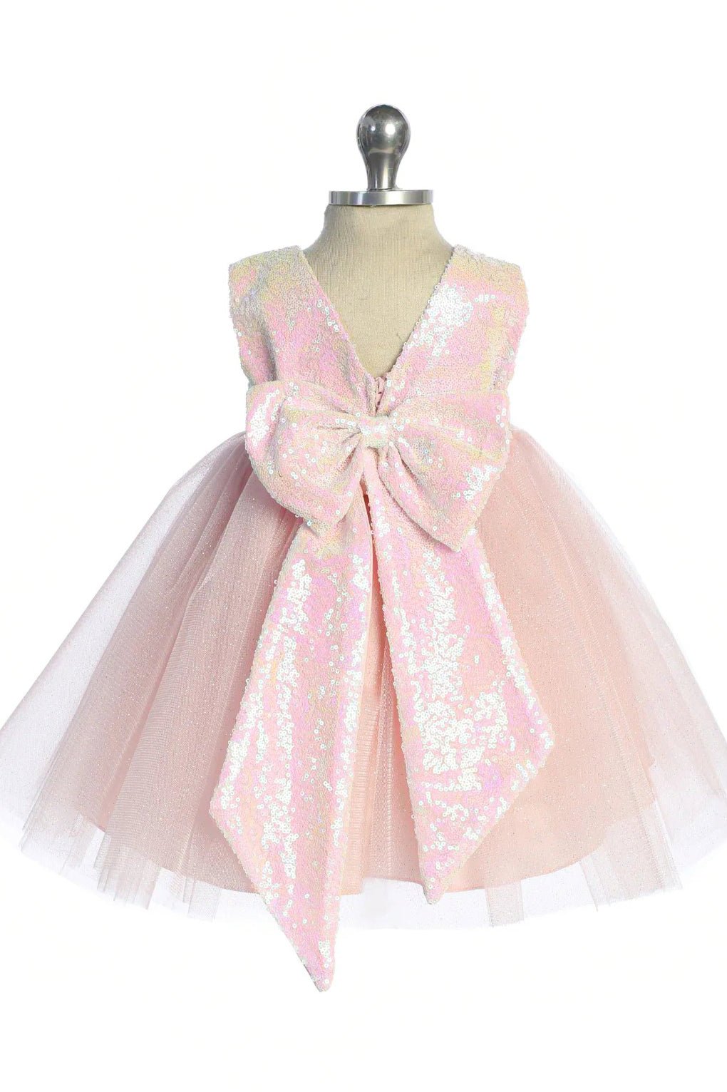 Pink sequin flower girl dress with a large bow.