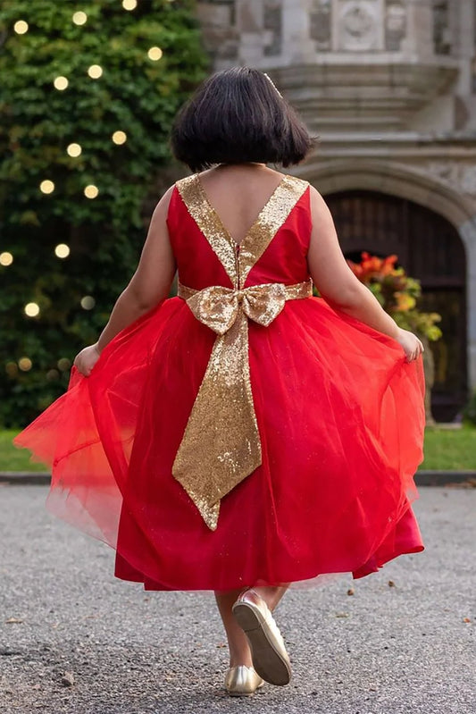 Red flower girl dress with a gold bow back.