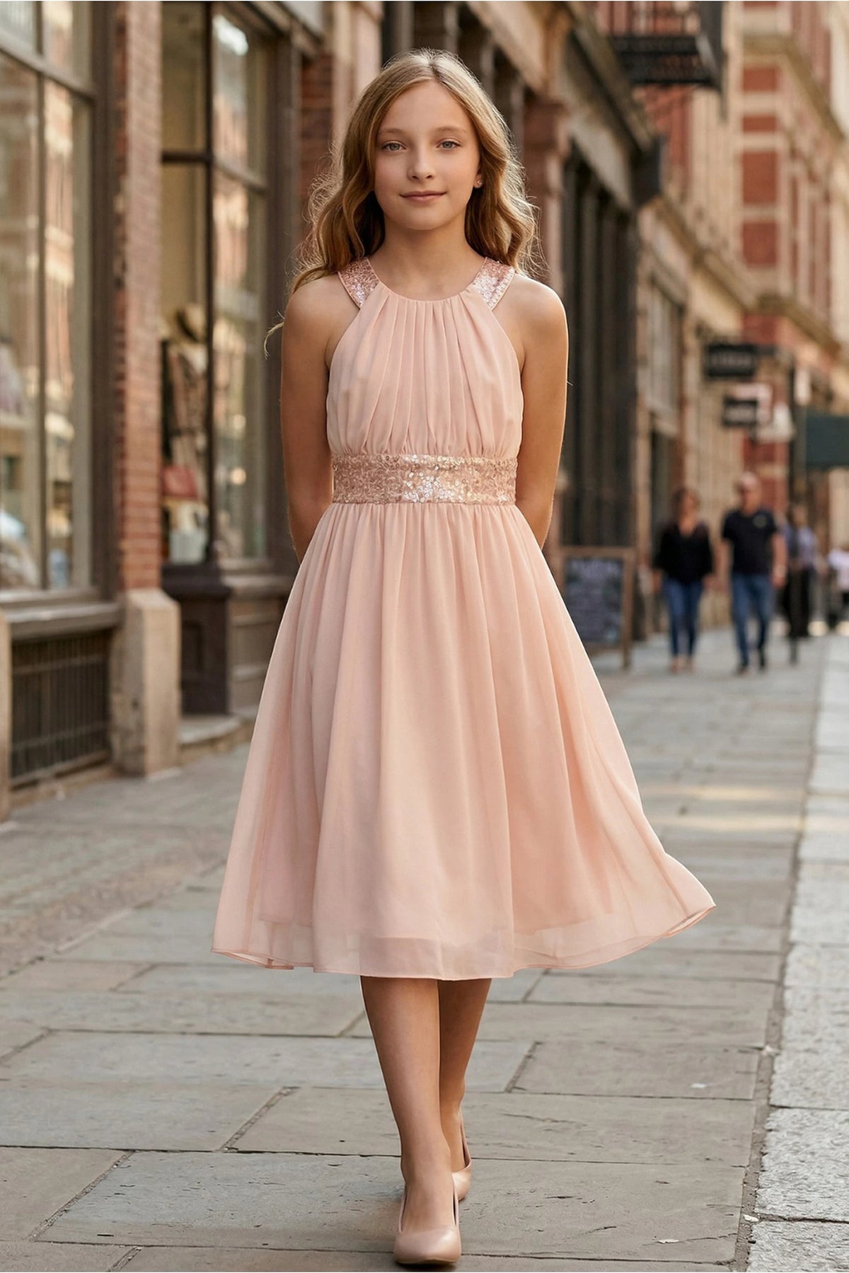 Showcasing with a sparkling sequin waistband, this Blush kids party dress displays elegant detail.