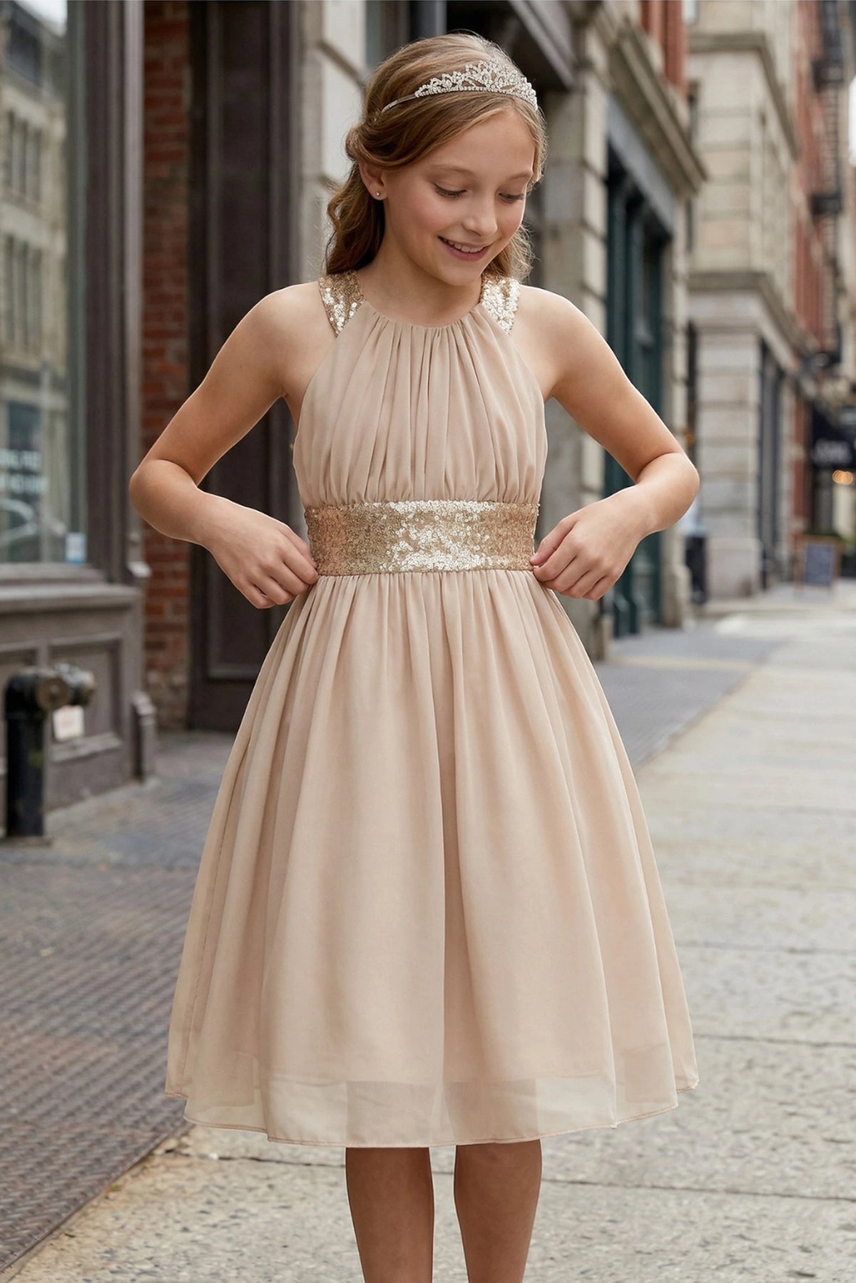 Accented a sparkling sequin waistband adds character to this Champagne kids party dress.