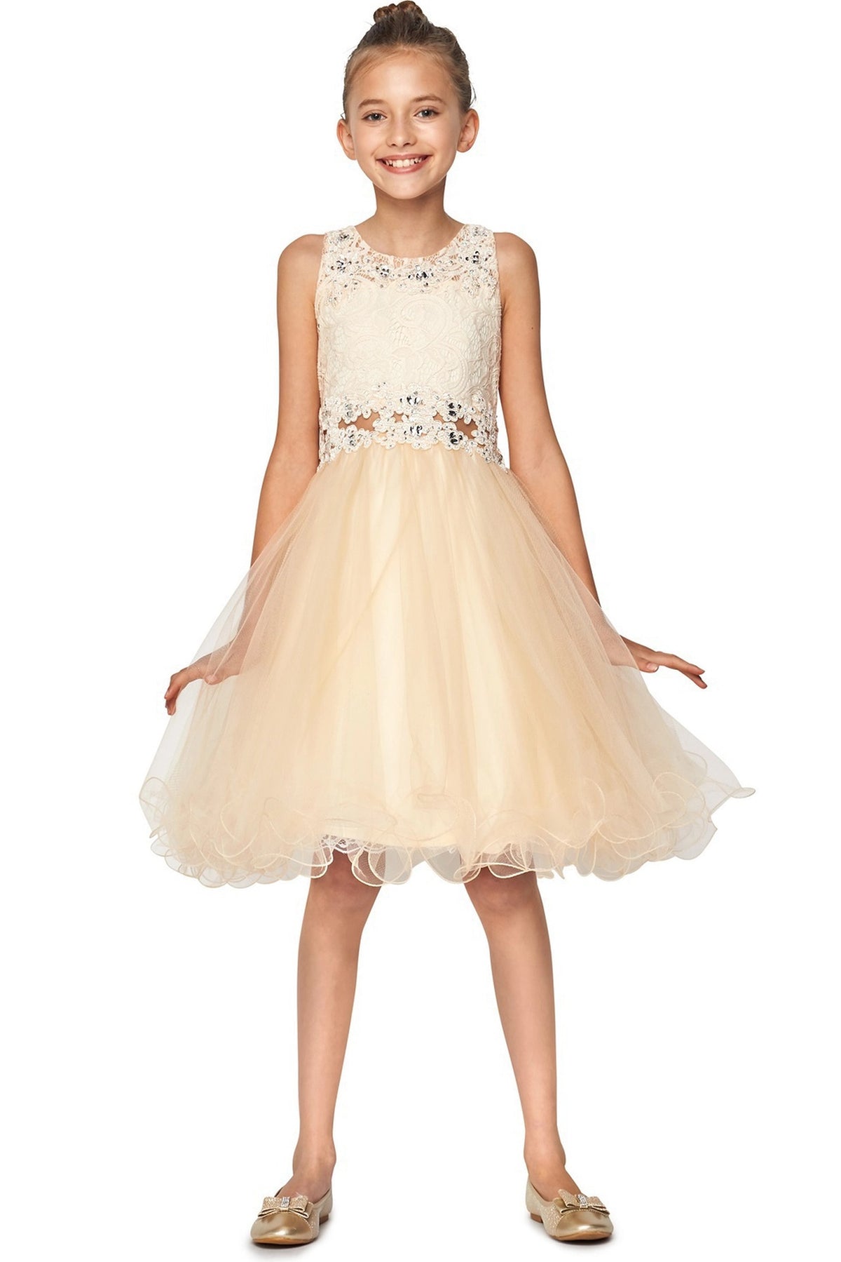 Detailed by beaded floral lace on the bodice, the Champagne kids party dress reveals its construction.
