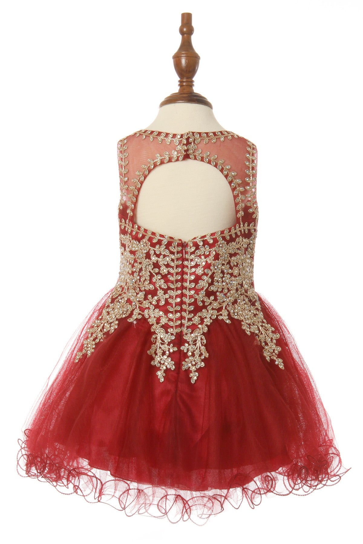 Burgundy flower girl dress back view highlighting flowing tulle skirt and elegant silhouette.