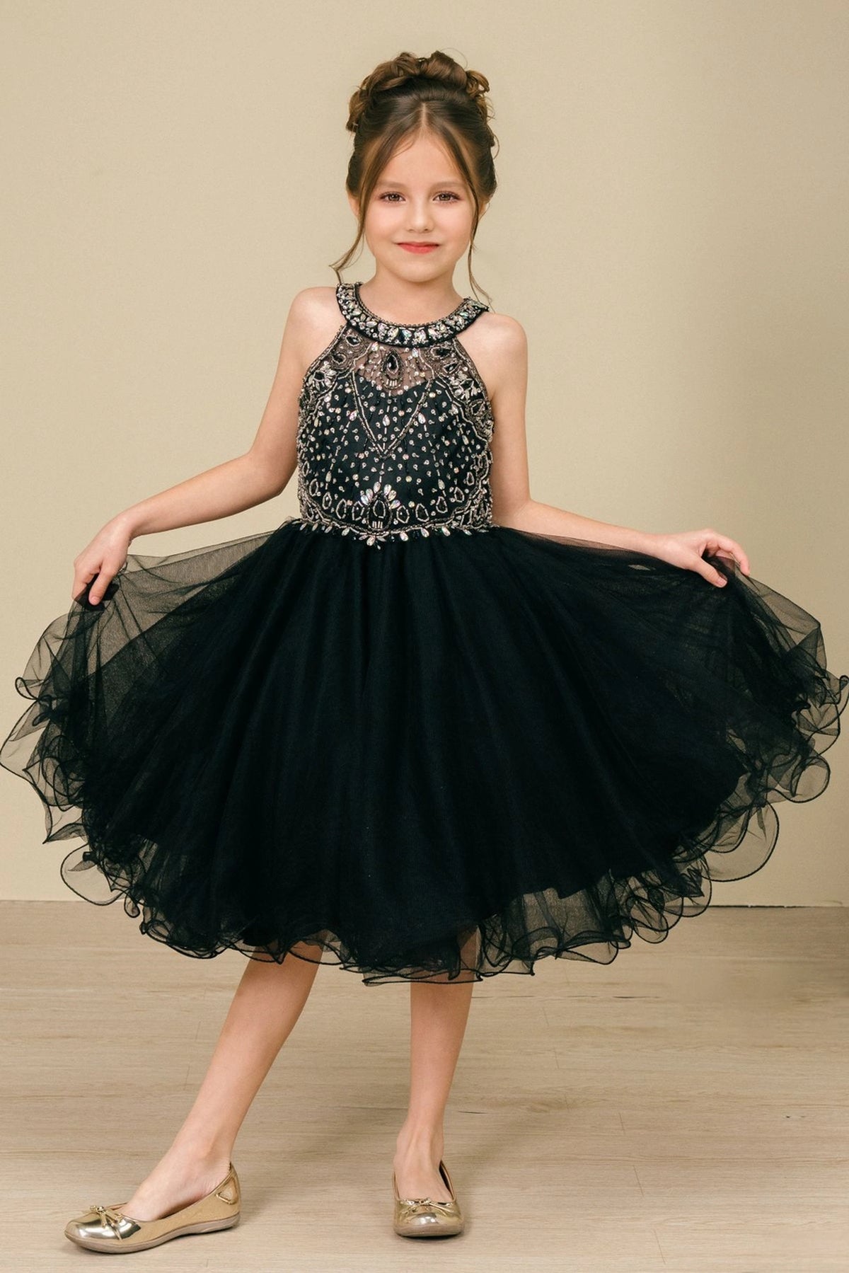 Showcasing with crystal beading across the bodice, this Black kids party dress displays elegant detail.