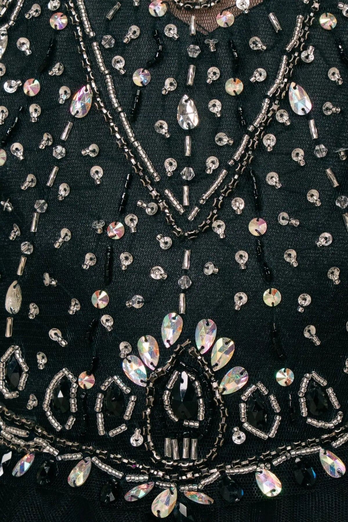 Featuring with crystal beading across the bodice, this Black kids party dress displays elegant detail.
