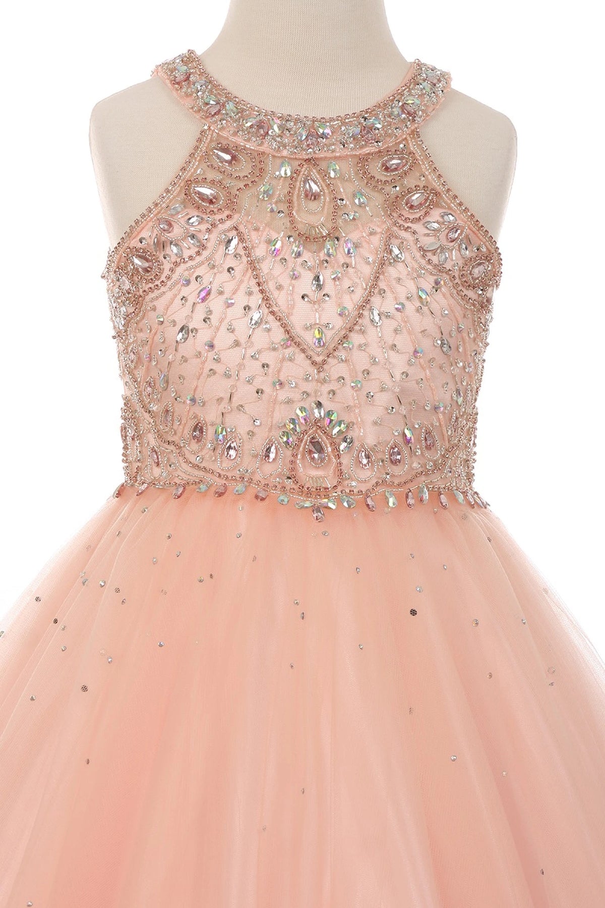 Showcasing geometric rhinestone and sequin bodice details on the Blush mini quince dress.