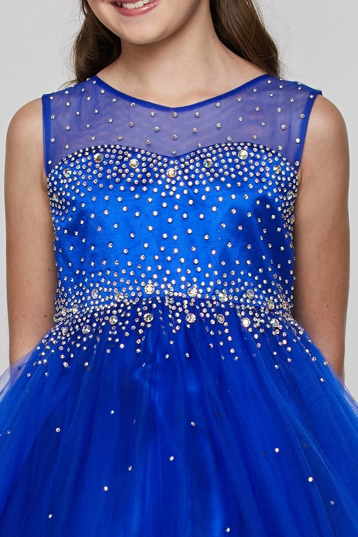 Showcasing with a rhinestone-covered bodice, this Royal Blue kids party dress displays elegant detail.