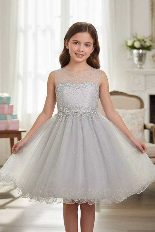 Finished details of a layered tulle skirt distinguish the Silver kids party dress.