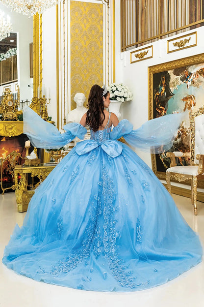 a woman wearing bahama blue quinceañera, lace-up back, detachable puff sleeves and long train with embroidery