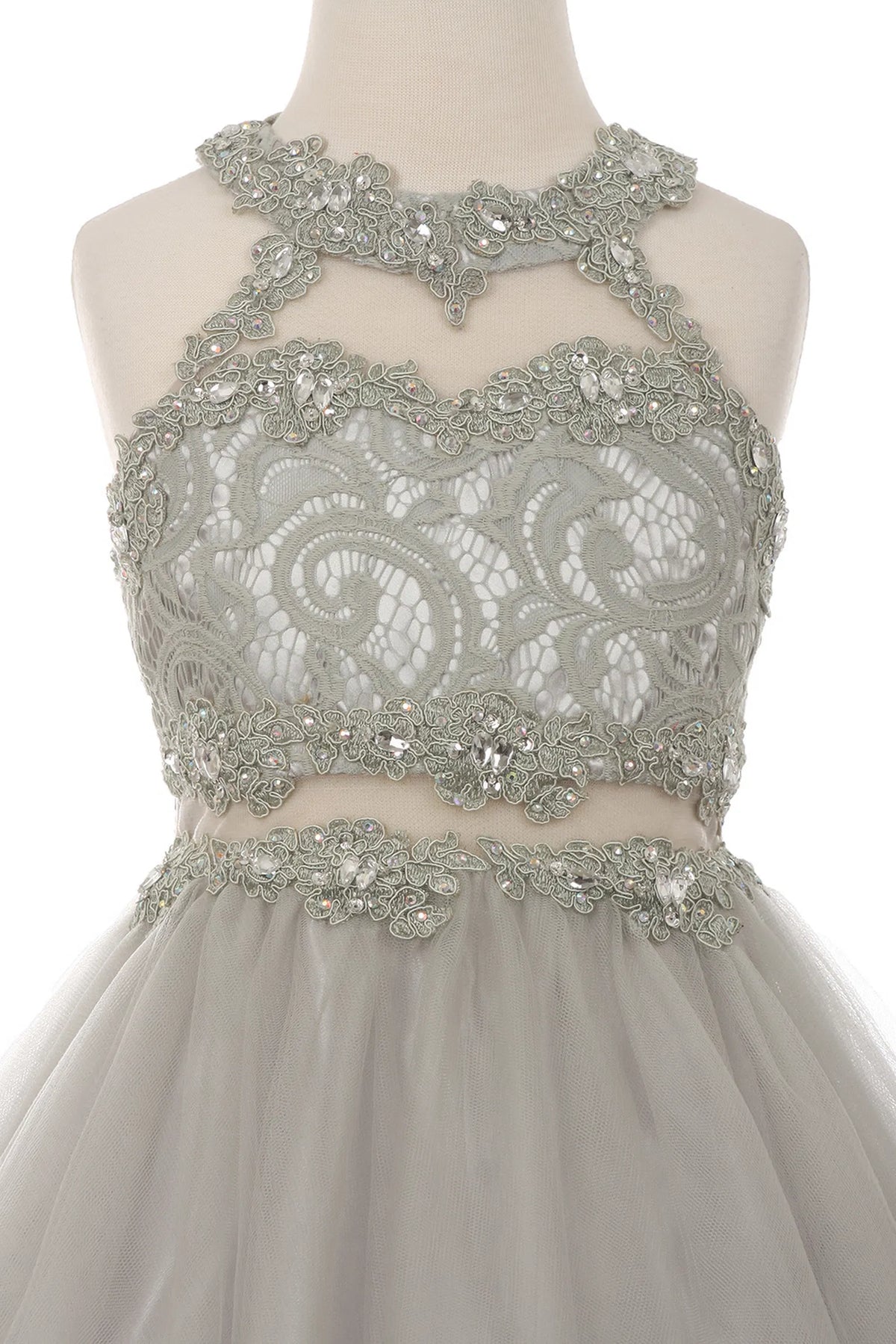 A Silver kids dress with beaded halter neckline and scalloped lace.